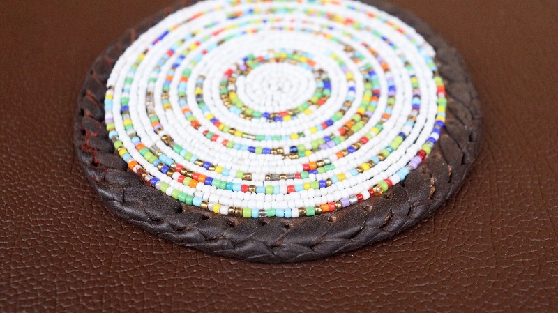 White With Brown Outline Rainbow Beaded Mat