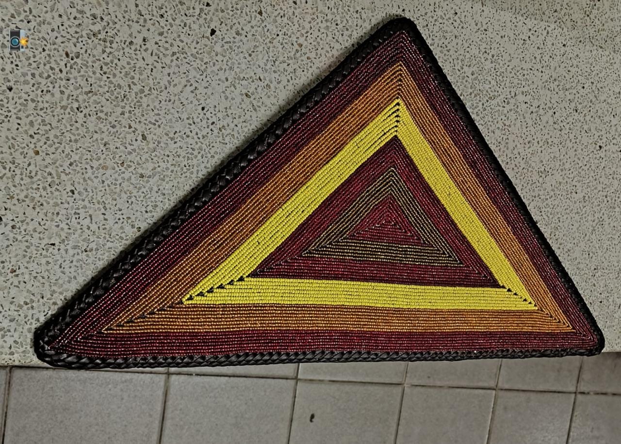 Triangular beaded placemat