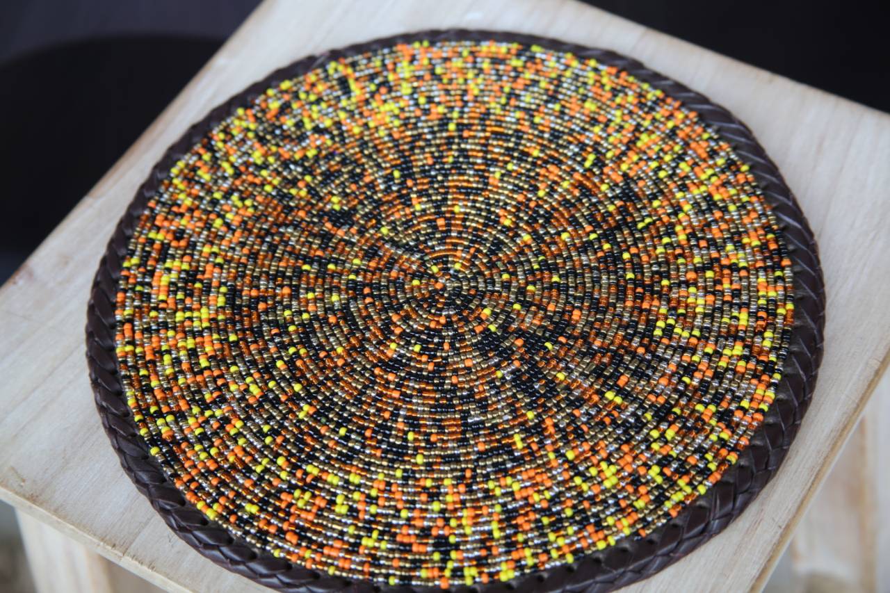 Circular Intricately Beaded Leather Placemat