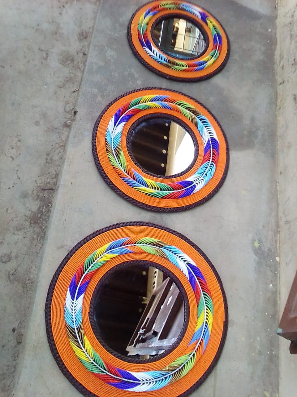 Leaf design beaded mirrors