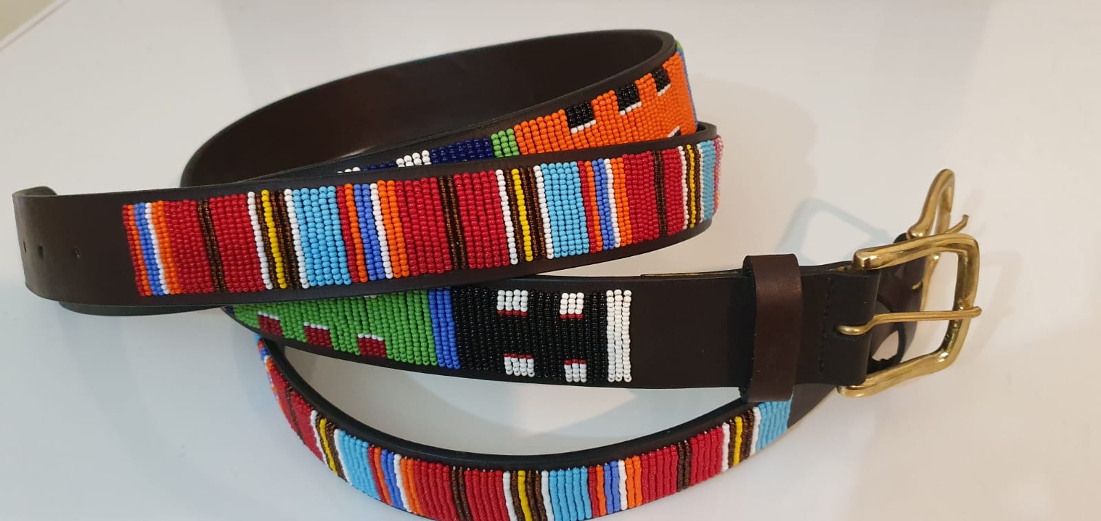 Leather belts with beaded patterns