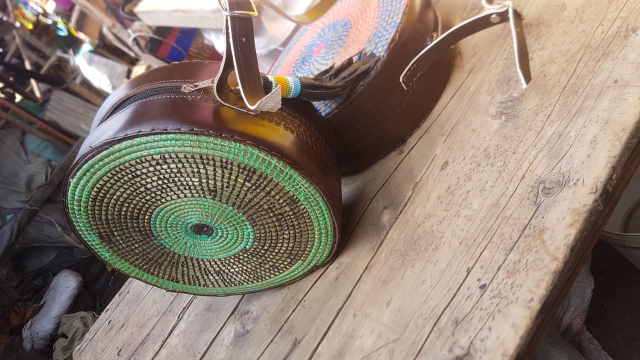 Elegant green beaded faux leather sling bag