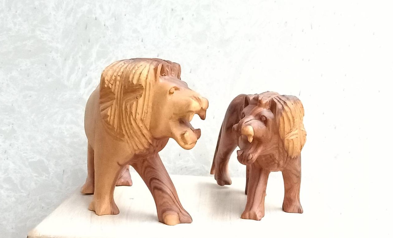 Wooden Lions Sculptures