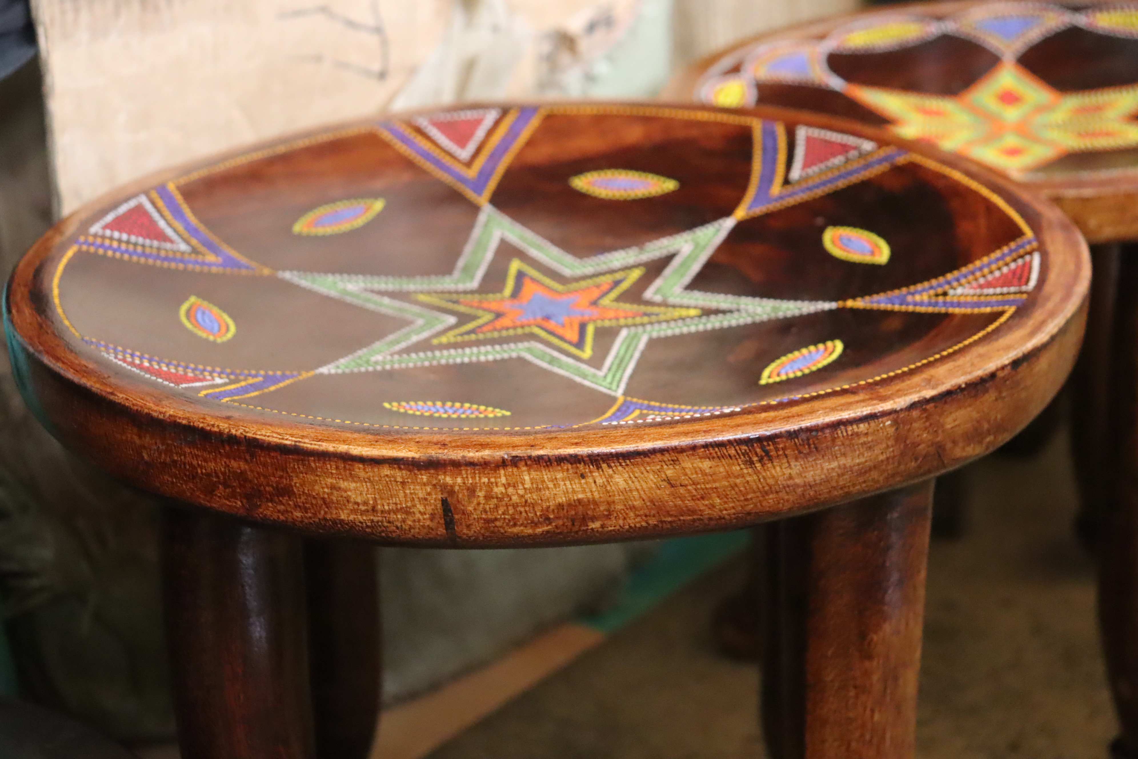 Three-legged beaded traditional stool
