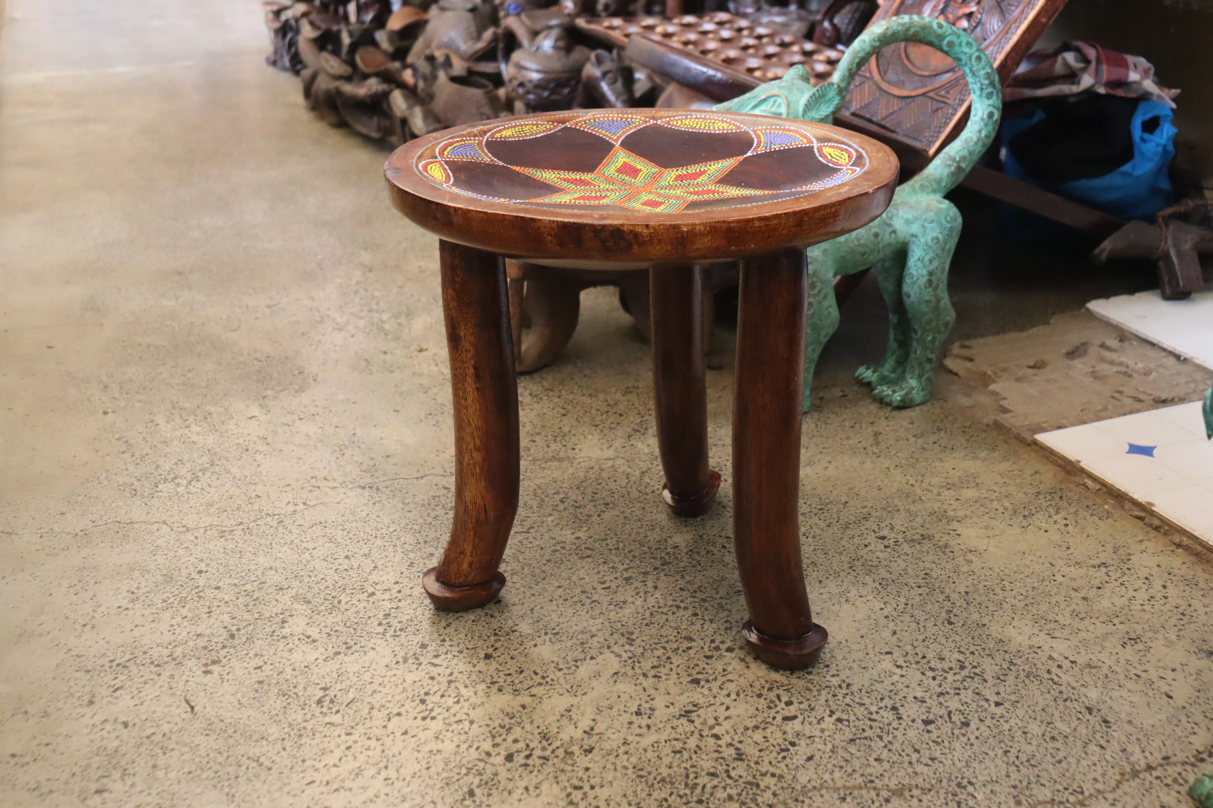 Three-legged beaded traditional stool