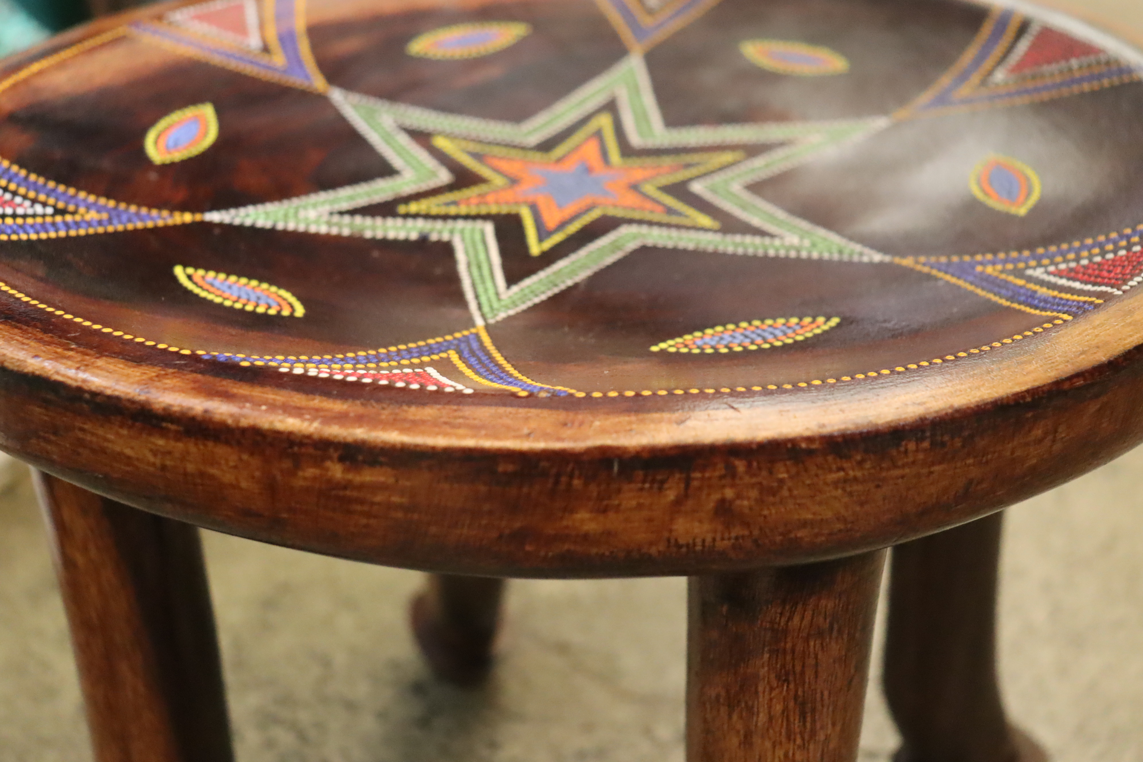 Timeless 4-legged traditional stool with beaded star pattern