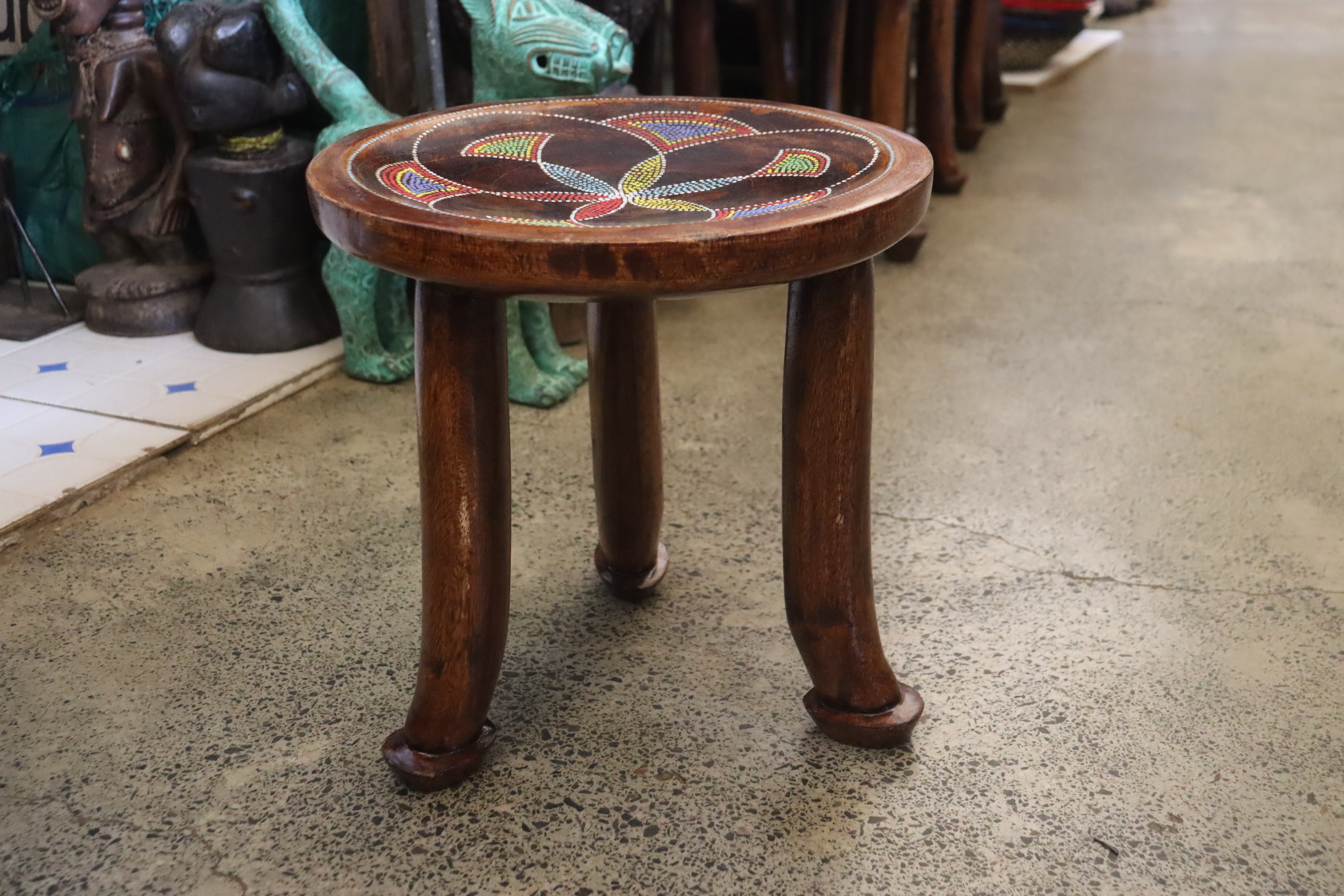 Three-legged beaded traditional stool