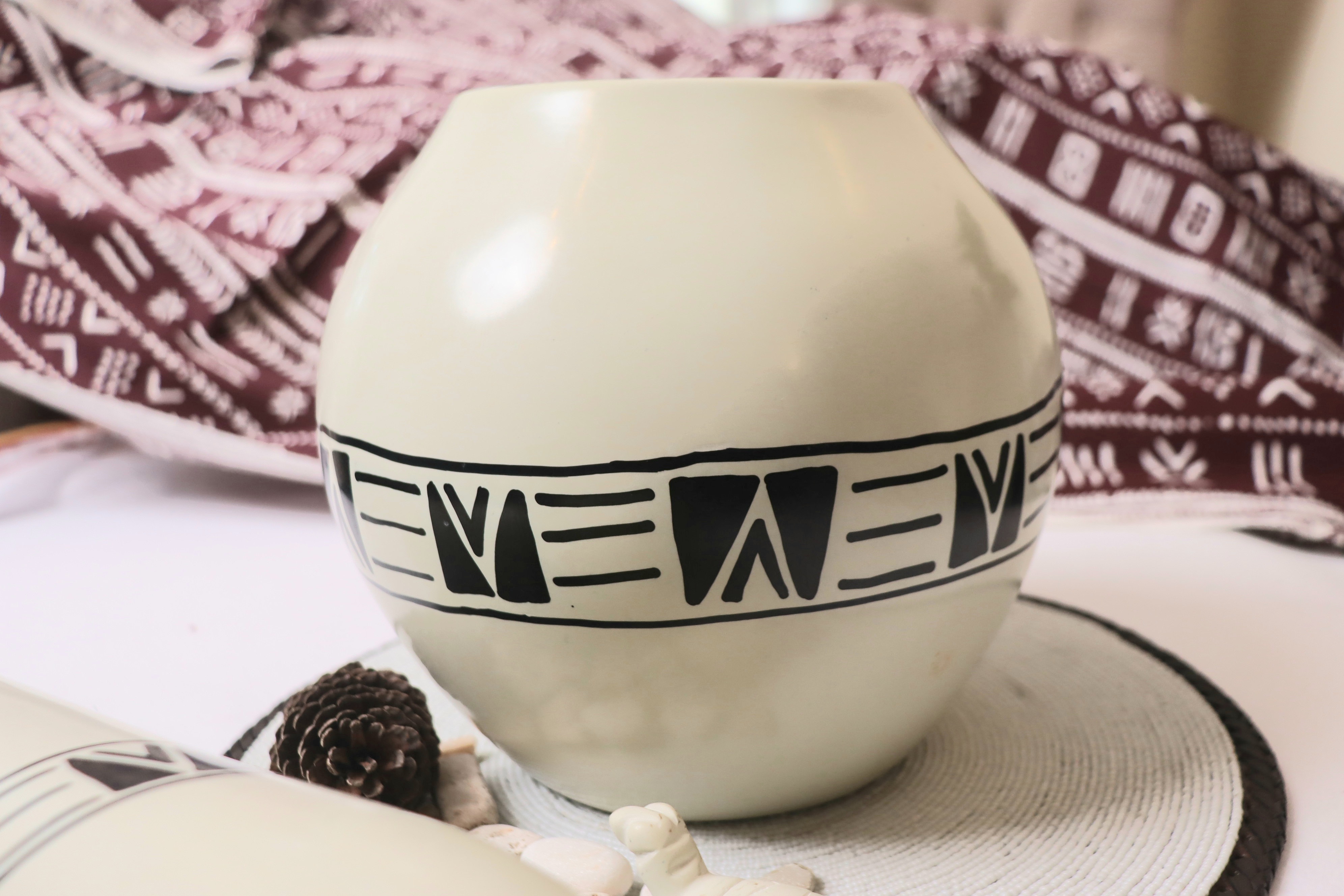 Elegant circular soapstone white vase.