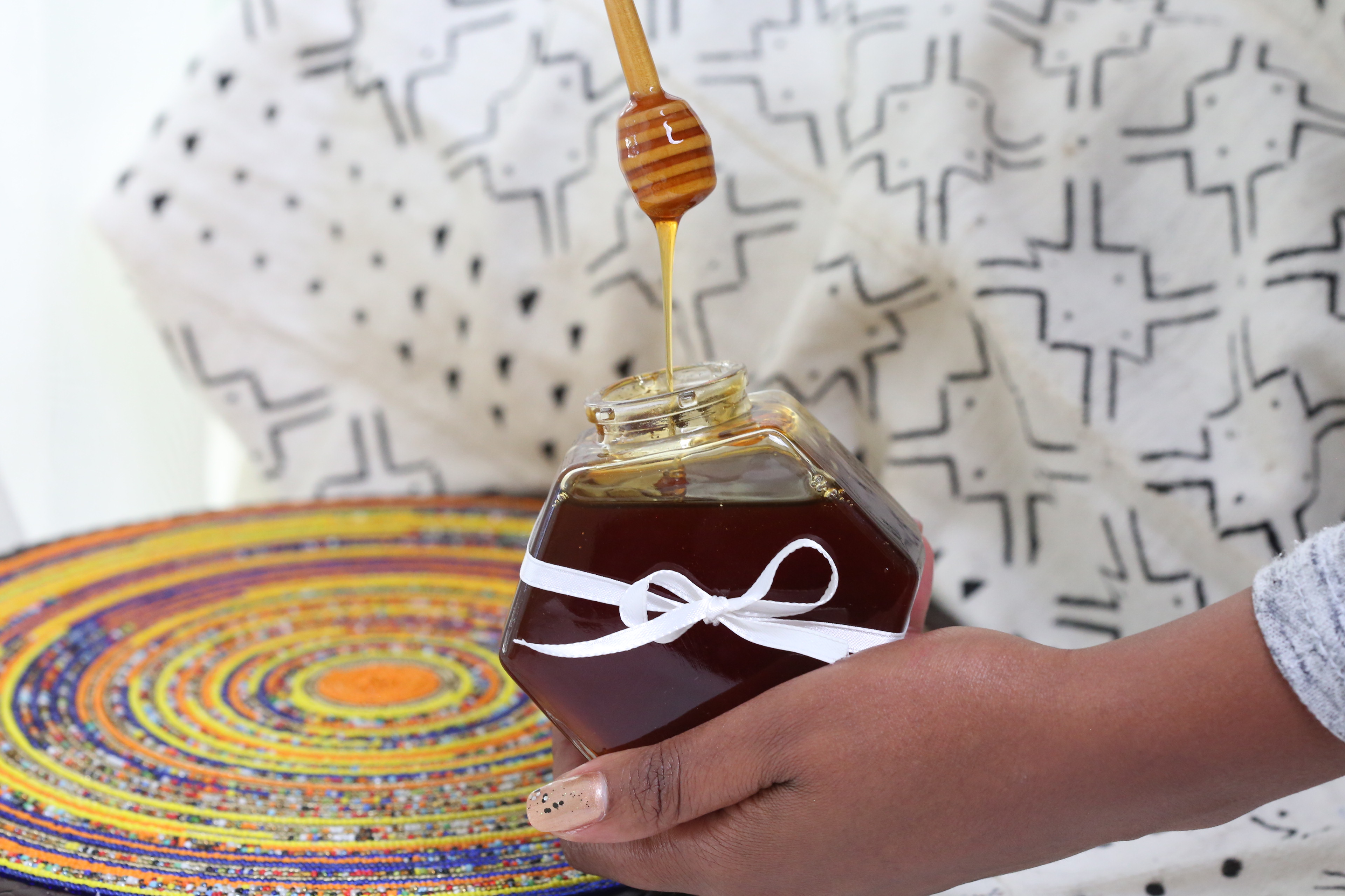 Beaded placemat with honey jar gift package